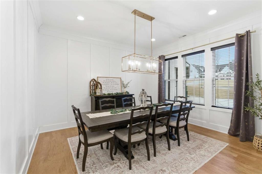 189 Waterview Circle Newnan, GA 30263 - Photo 6 of 83 a view of a dining room with furniture window and wooden floor