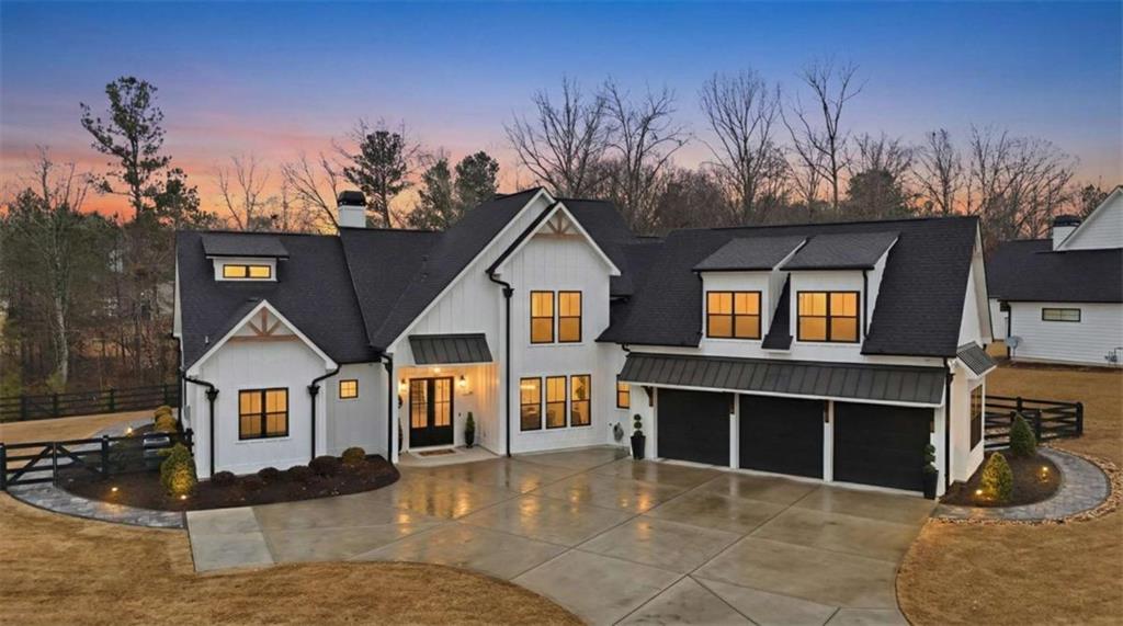 189 Waterview Circle Newnan, GA 30263 - Photo 71 of 83 a front view of a house with a yard and garage