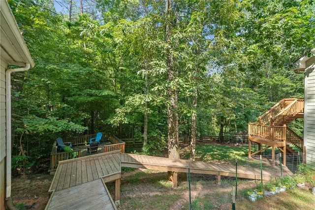 a view of a chair and tables in the patio