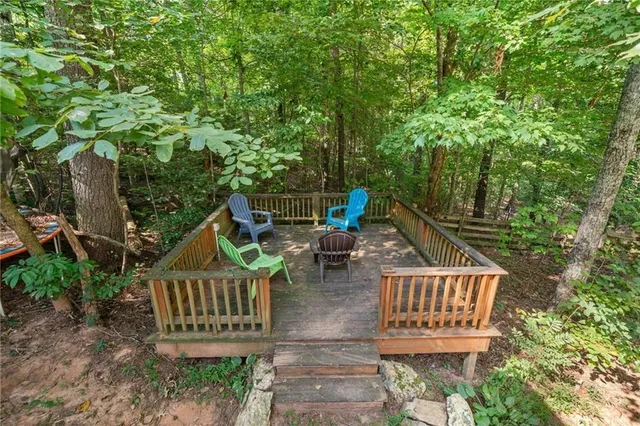 a view of outdoor space with deck and yard