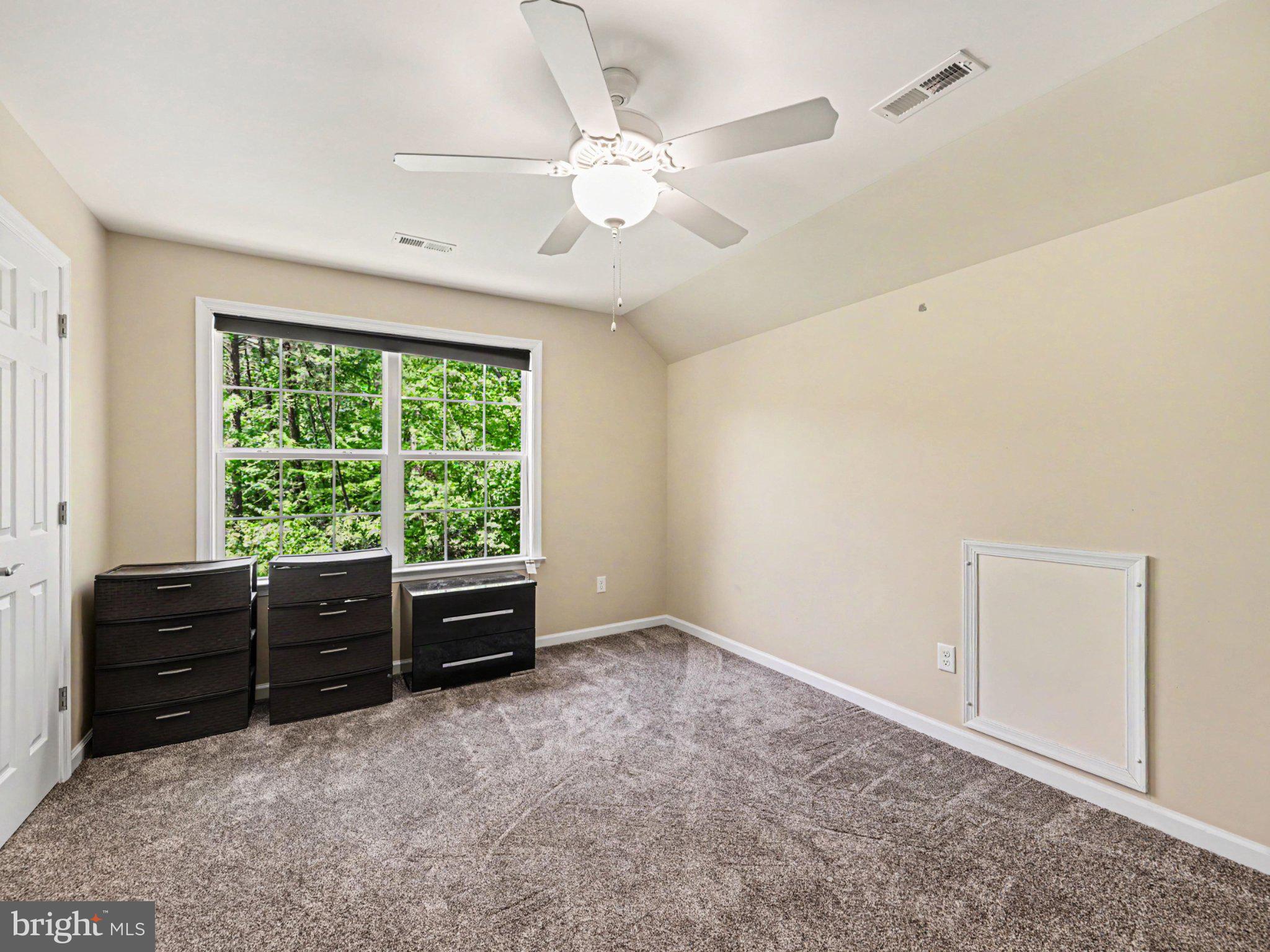 9811 Catharpin Road Spotsylvania, VA 22551 - Photo 18 of 30 wooden floor in an empty room with a window