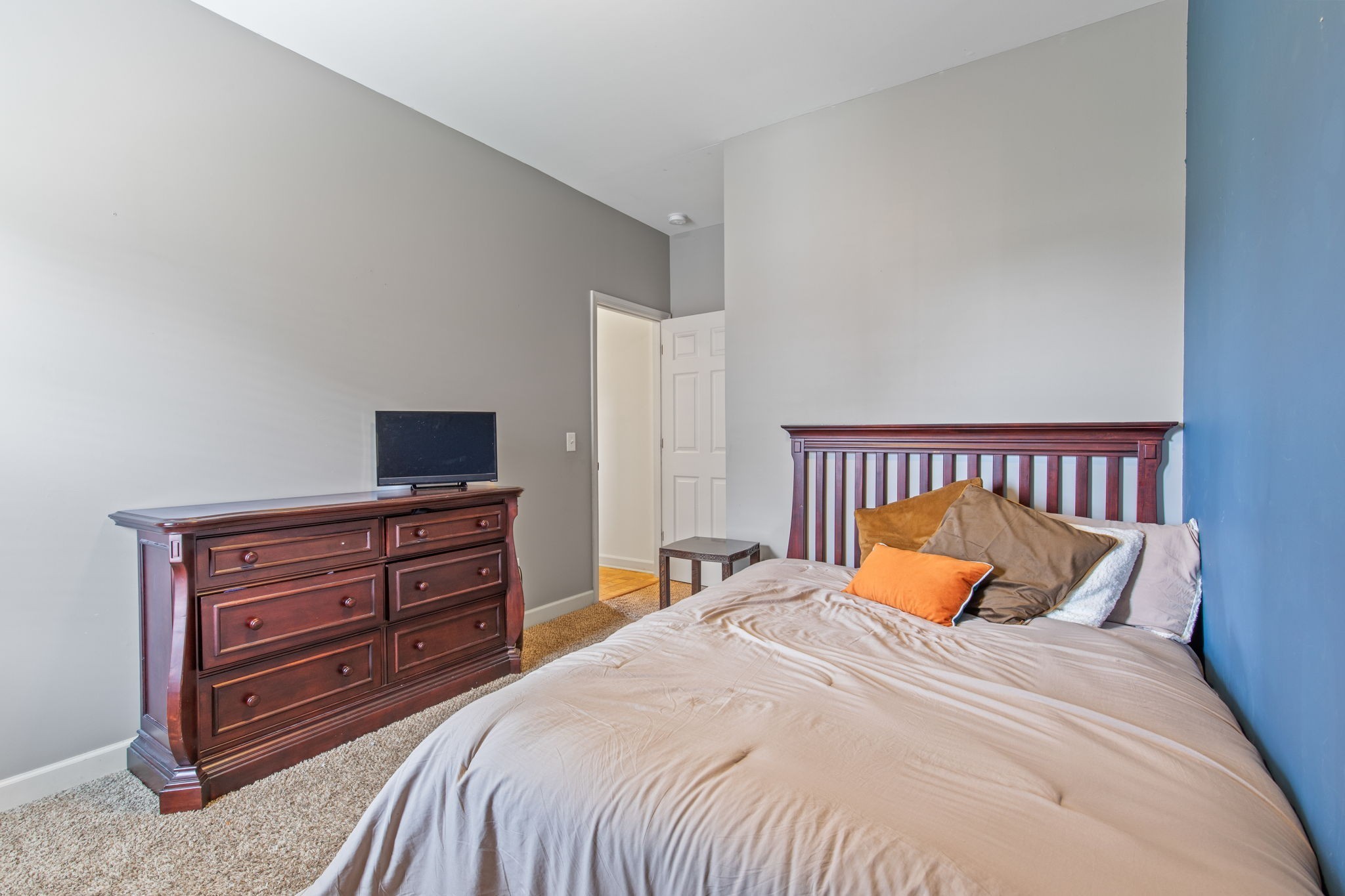 1008 Rhett Place Lebanon, TN 37087 - Photo 17 of 35 a bedroom with a bed and a television