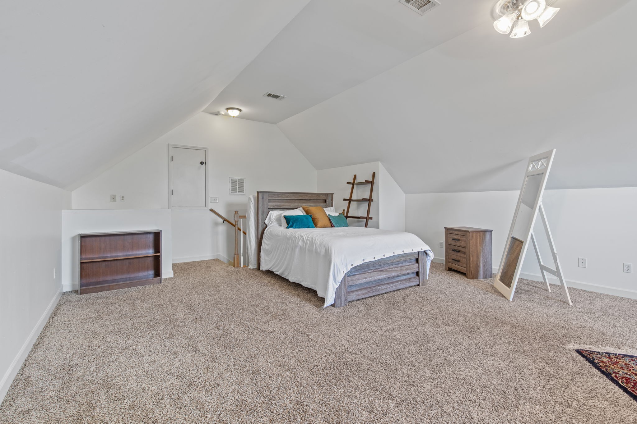 1008 Rhett Place Lebanon, TN 37087 - Photo 23 of 35 a spacious bedroom with a bed and a cabinets