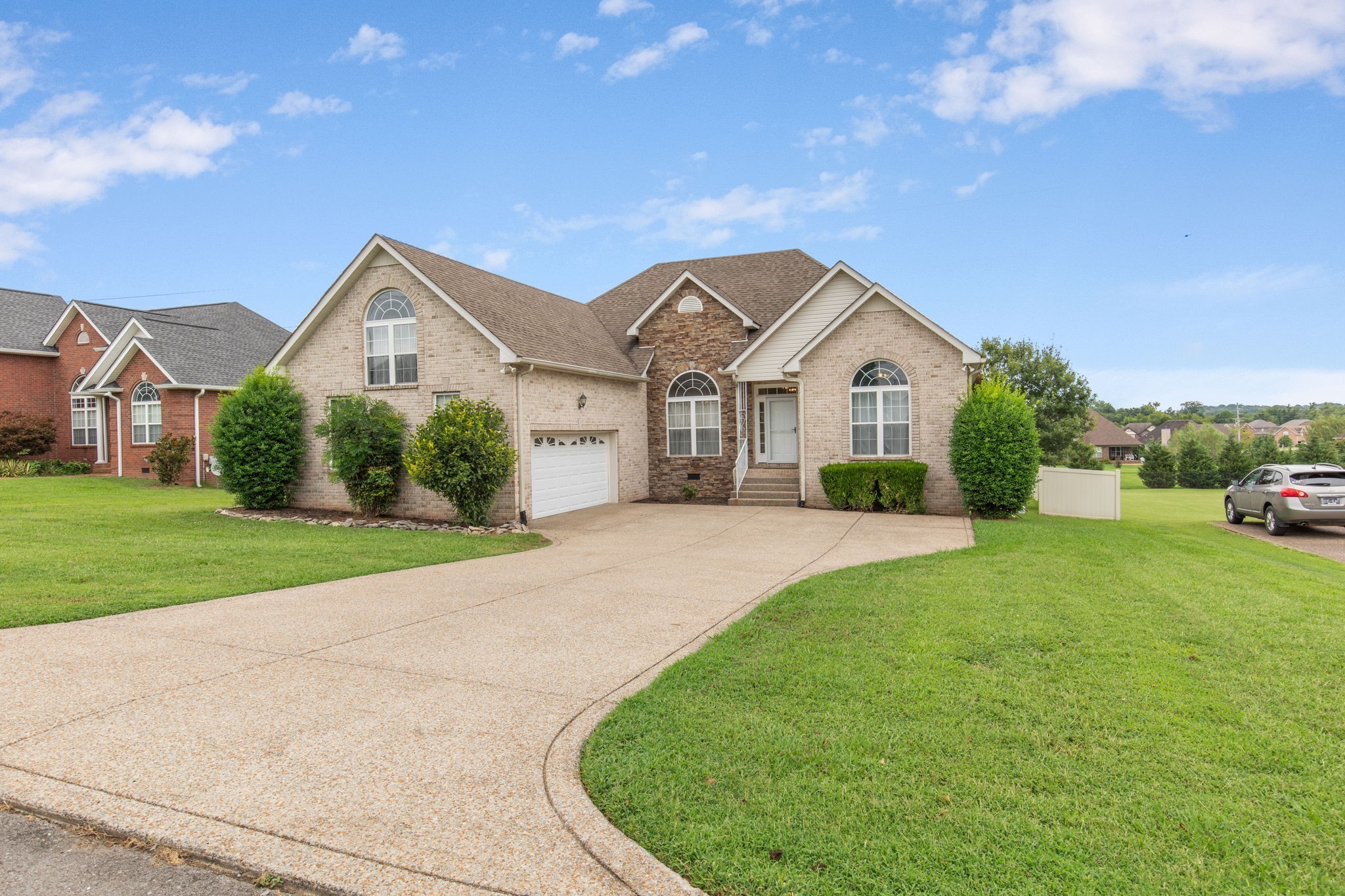 1008 Rhett Place Lebanon, TN 37087 - Photo 35 of 35 a front view of a house with a yard and garage