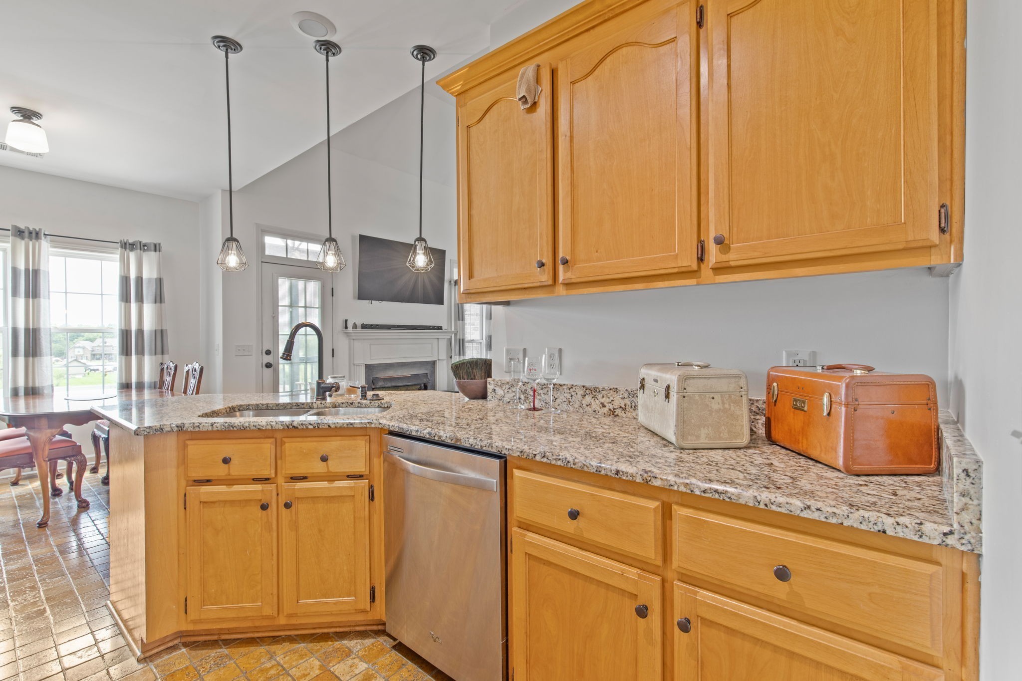 1008 Rhett Place Lebanon, TN 37087 - Photo 9 of 35 a kitchen with granite countertop a sink a stove and cabinets