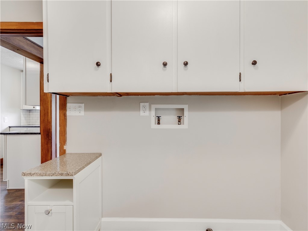 850 Rice Street Alliance, OH 44601 - Photo 22 of 29 Laundry area hook up with cabinets for storage