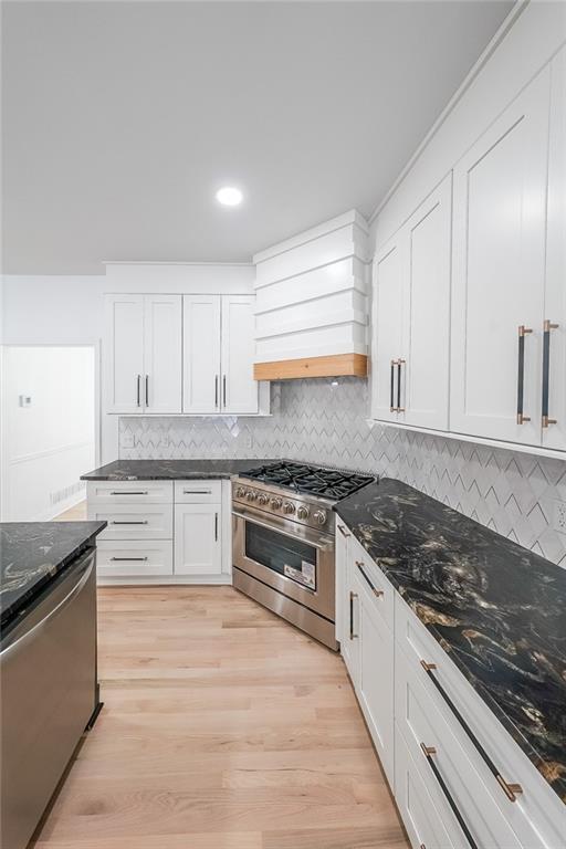 2130 Federal Road Roswell, GA 30075 - Photo 15 of 34 a kitchen with granite countertop cabinets stainless steel appliances and a counter space