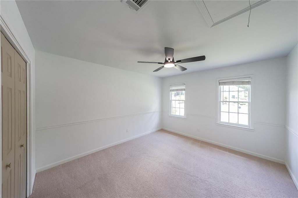 2130 Federal Road Roswell, GA 30075 - Photo 26 of 34 a view of an empty room with a window