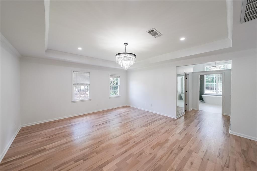 2130 Federal Road Roswell, GA 30075 - Photo 28 of 34 wooden floor in an empty room with a window