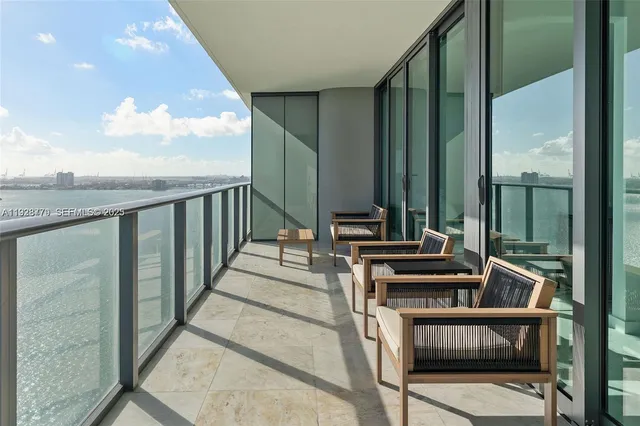 a view of an ocean and city