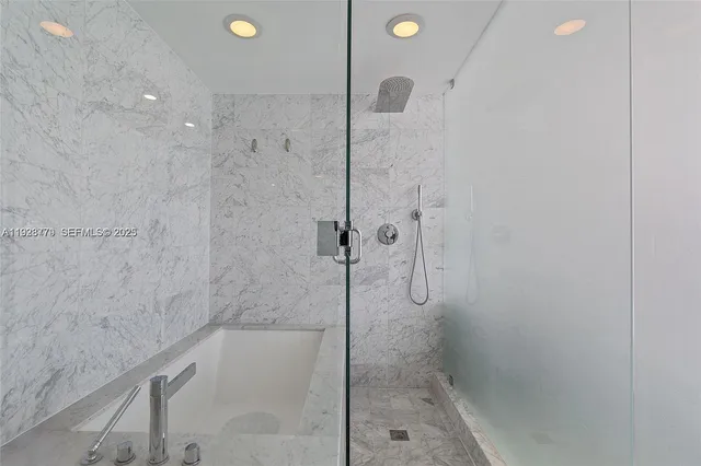 a living room with furniture and a chair