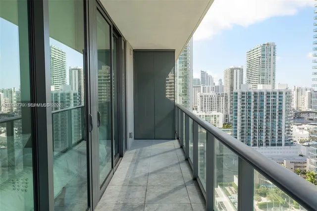 a bathroom with a sink toilet and mirror