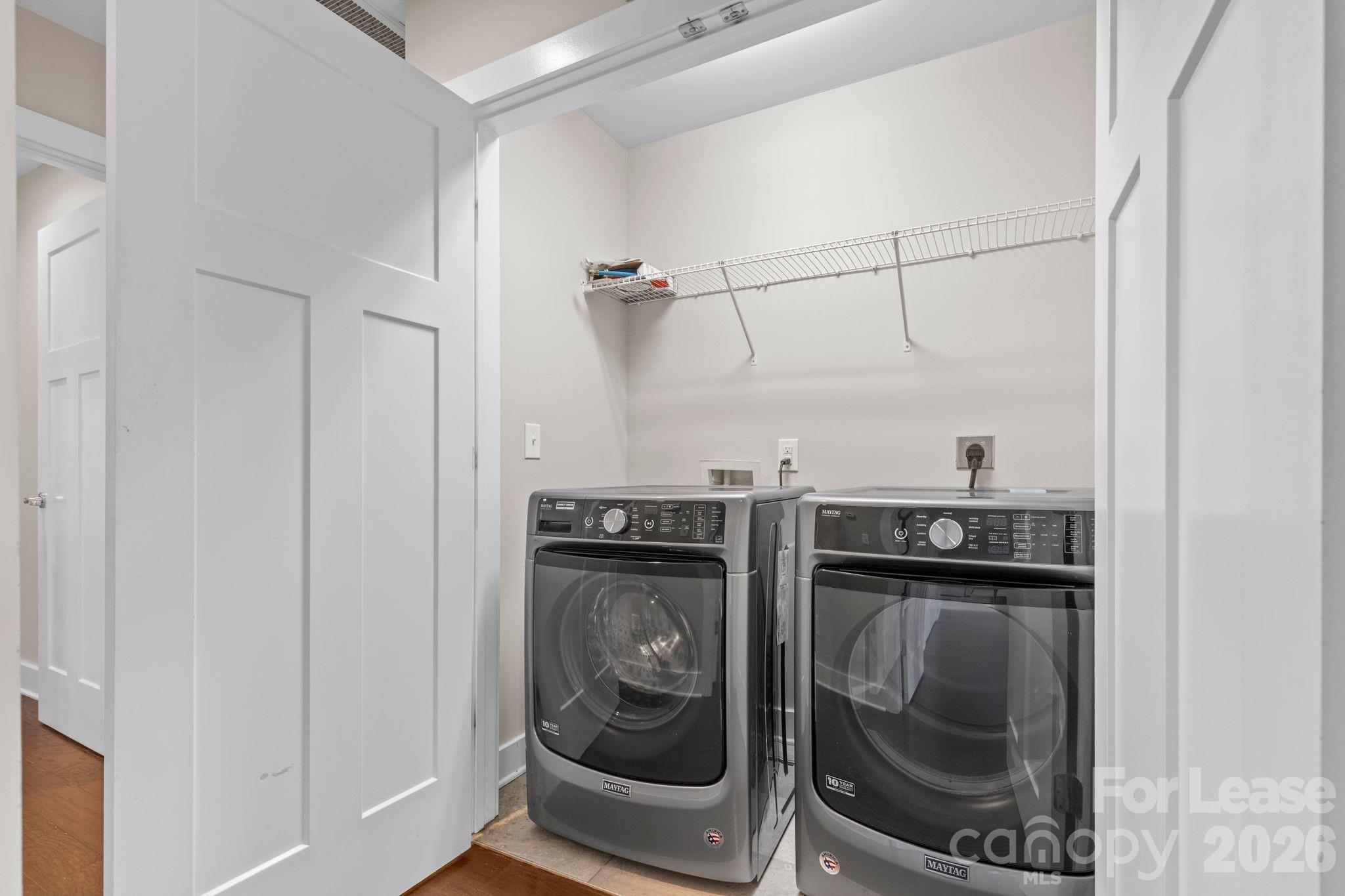 129 Grandin Road Charlotte, NC 28208 - Photo 20 of 26 a utility room with dryer and washer