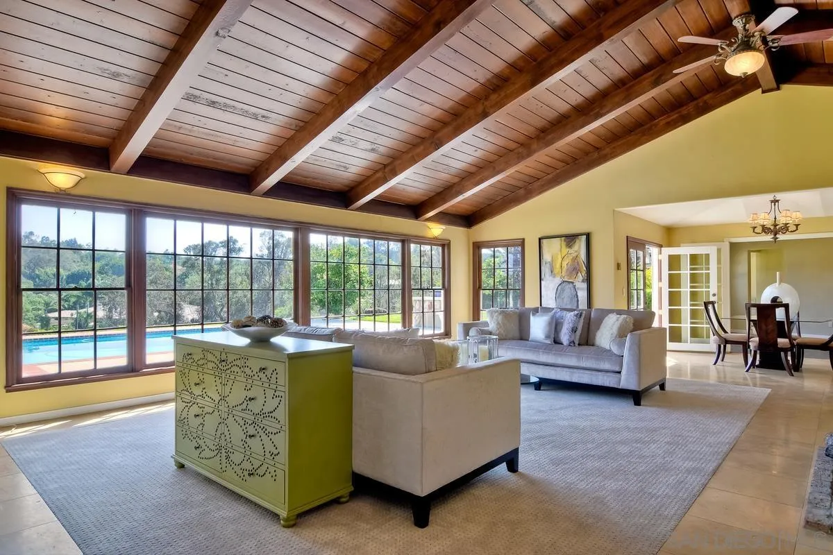 5460 La Crescenta Road Rancho Santa Fe, CA 92067 - Photo 16 of 27 a living room with furniture and a large window