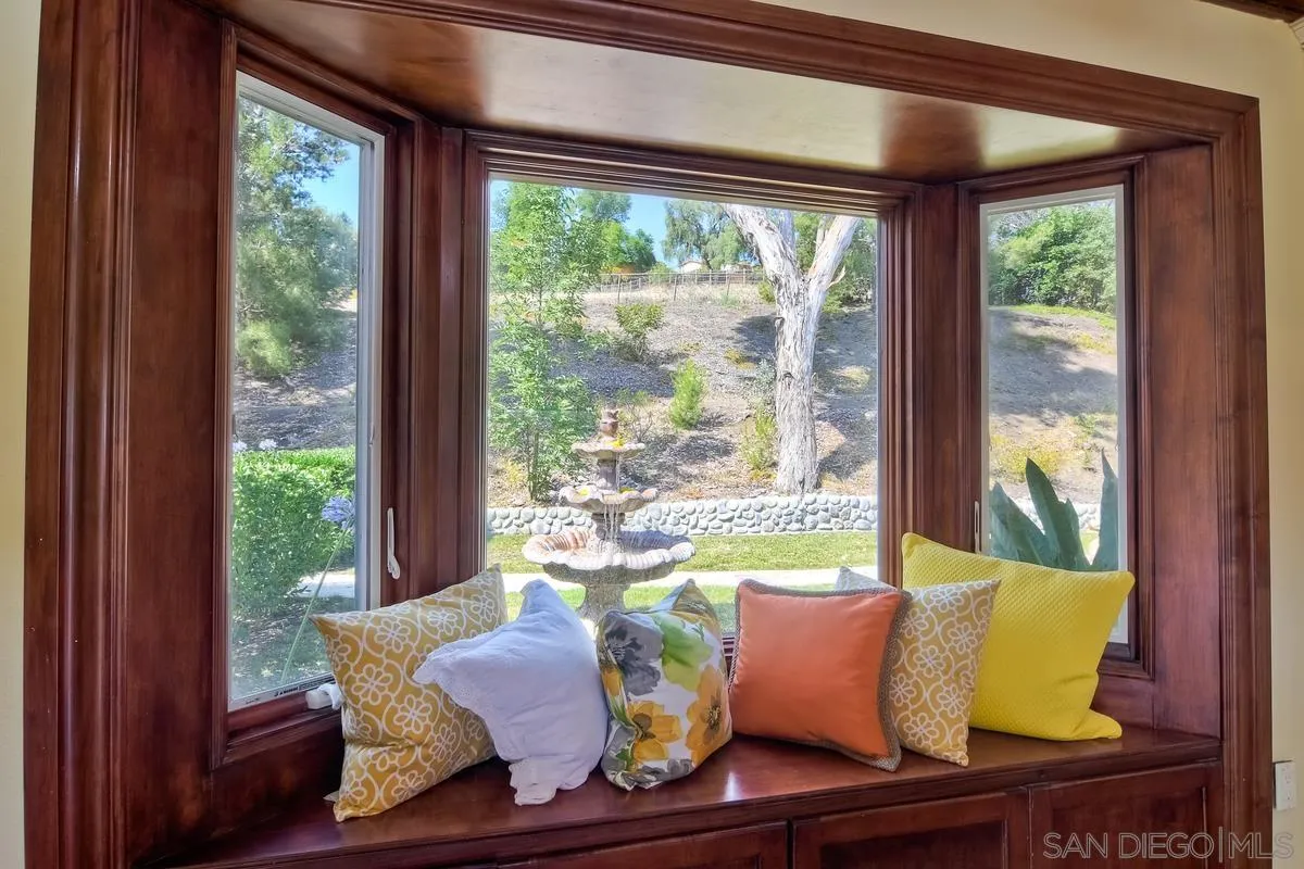 5460 La Crescenta Road Rancho Santa Fe, CA 92067 - Photo 17 of 27 a living room with furniture and a window