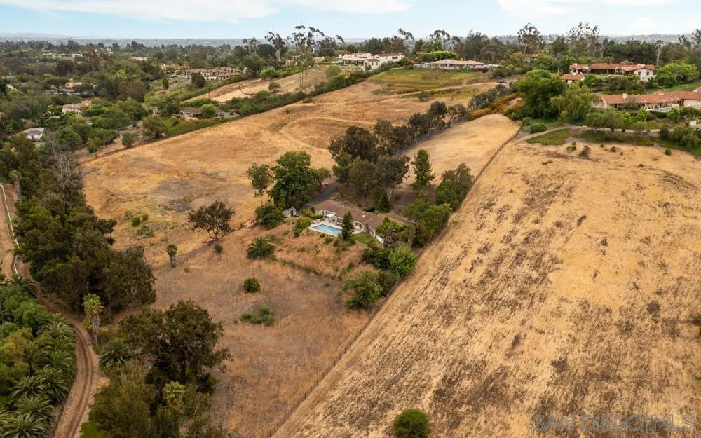 5460 La Crescenta Road Rancho Santa Fe, CA 92067 - Photo 2 of 27 an aerial view of residential houses with outdoor space