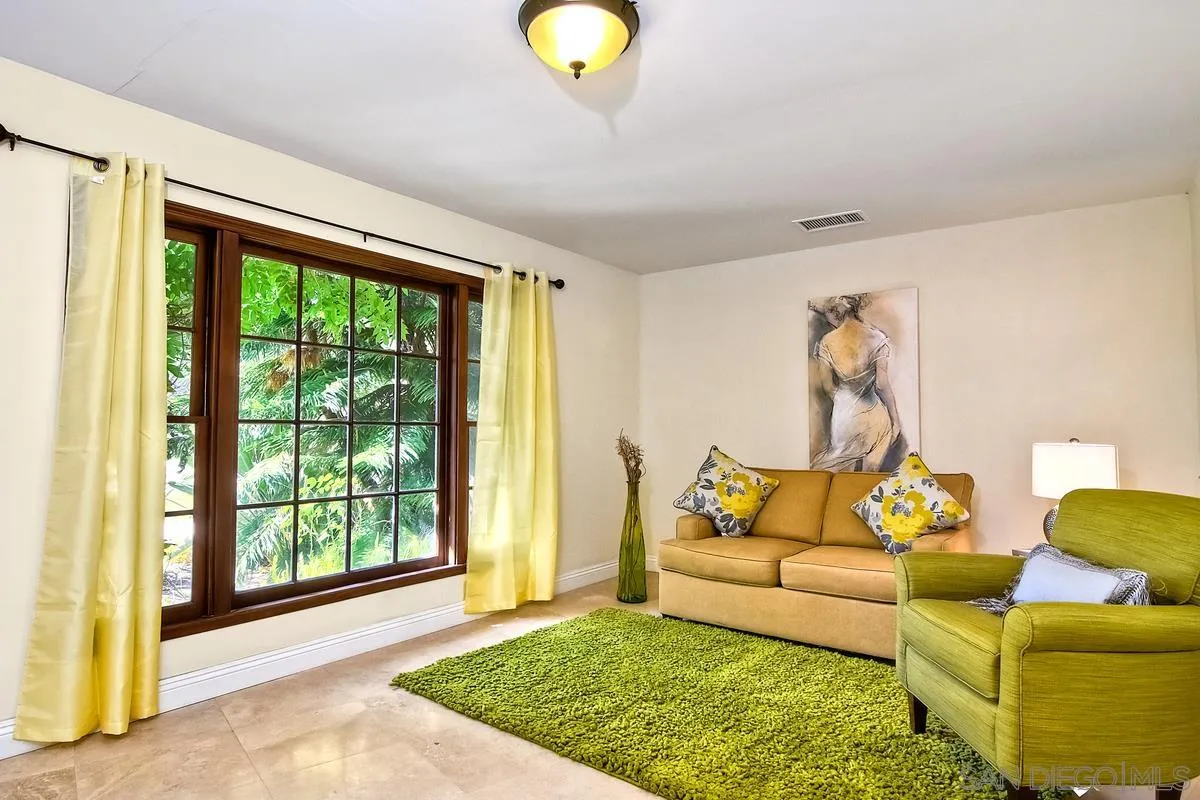 5460 La Crescenta Road Rancho Santa Fe, CA 92067 - Photo 21 of 27 a living room with furniture and a large window