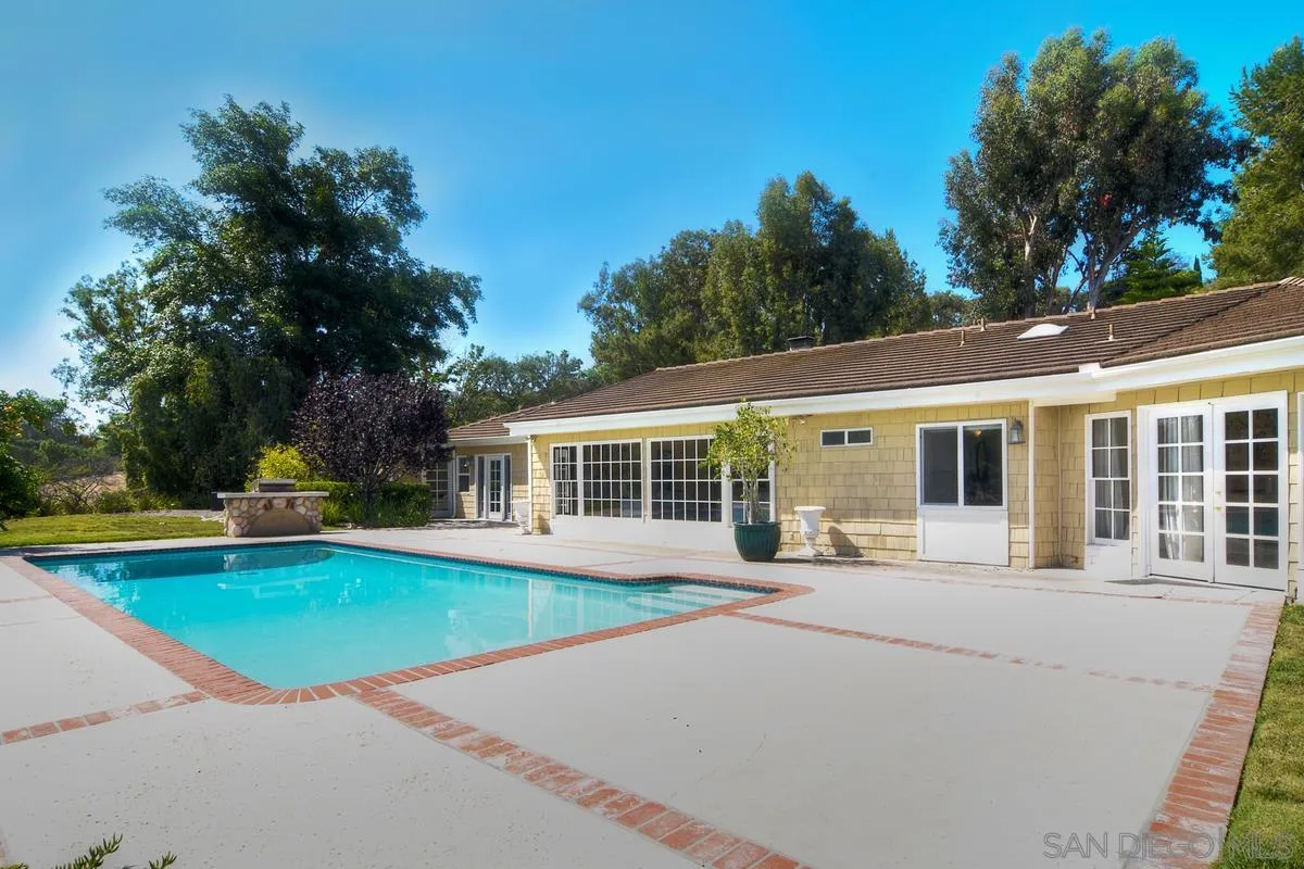 5460 La Crescenta Road Rancho Santa Fe, CA 92067 - Photo 24 of 27 a front view of house with yard and green space