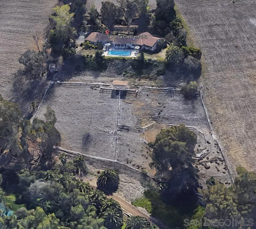 5460 La Crescenta Road Rancho Santa Fe, CA 92067 - Photo 25 of 27 a view of a dry yard with trees
