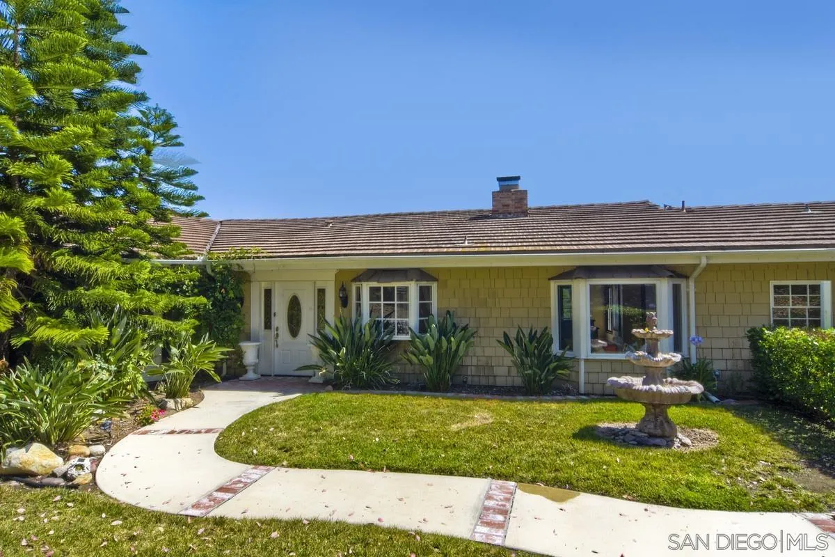5460 La Crescenta Road Rancho Santa Fe, CA 92067 - Photo 3 of 27 front view of a house with a yard