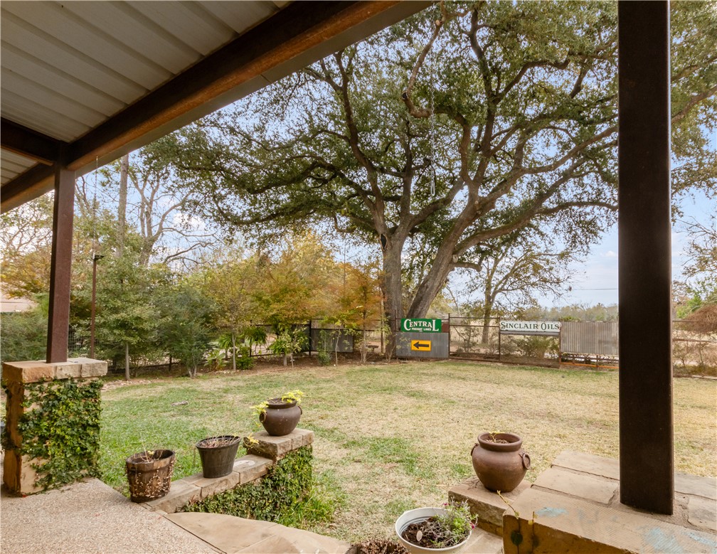402 Magnolia Gause, TX 77857 - Photo 3 of 27 a view of yard with swimming pool outdoor seating and barbeque oven