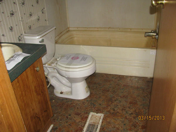 61 Swenfield Road Callaway, VA 24067 - Photo 11 of 13 a bathroom with a sink and a toilet
