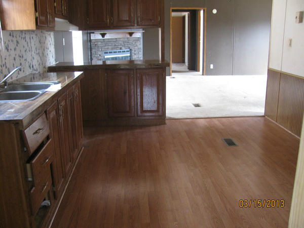 61 Swenfield Road Callaway, VA 24067 - Photo 3 of 13 a kitchen with granite countertop a sink and a stove