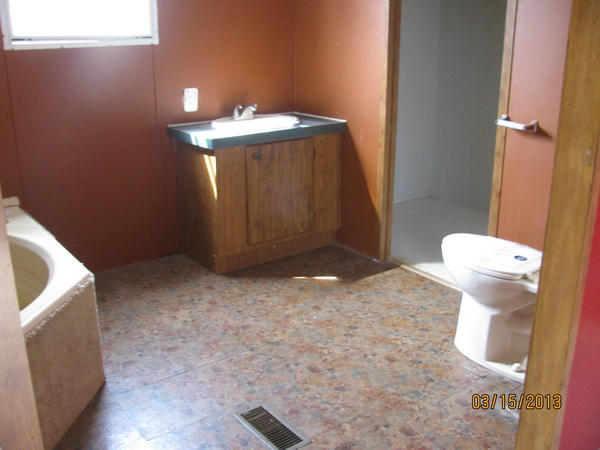 61 Swenfield Road Callaway, VA 24067 - Photo 9 of 13 a bathroom with a sink and toilet