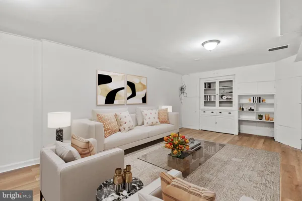 a view of an empty room with stairs