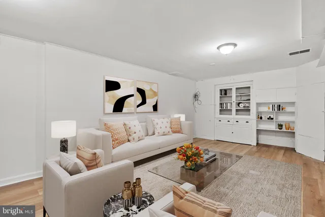 a view of an empty room with stairs