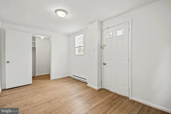 a brick building with a black and white checkered floor