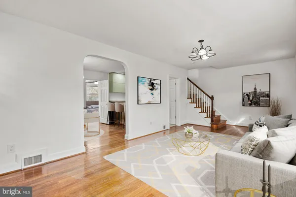 a view of a livingroom with furniture and wooden floor