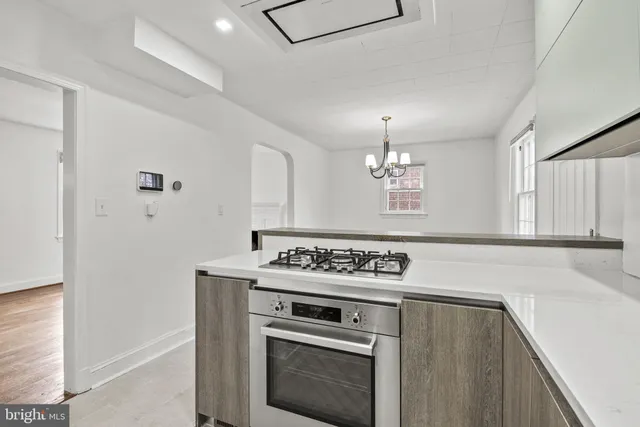 a utility room with washer and dryer