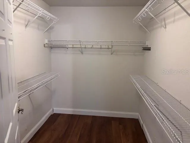 a view of a room with racks on the wall