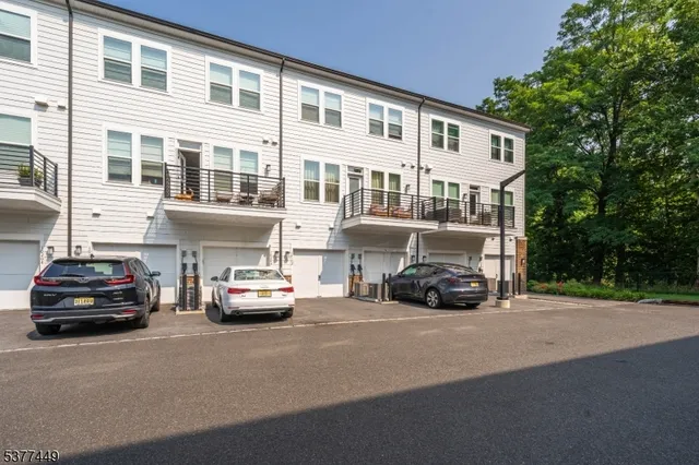 a car parked in front of a house