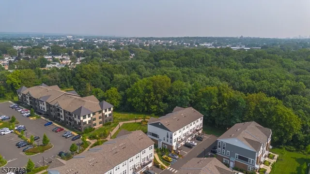 an aerial view of a house with a garden