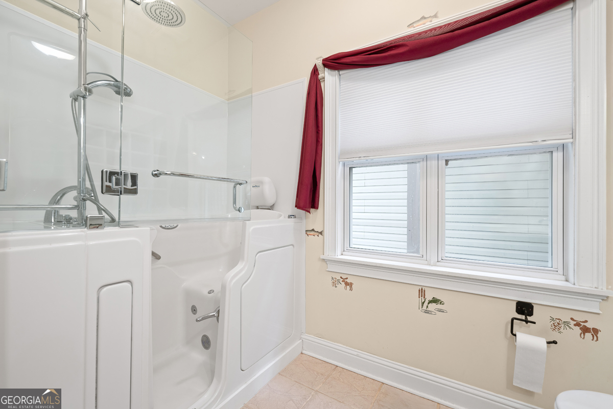 122 Hodges Lane Hartwell, GA 30643 - Photo 23 of 37 a bathroom with a sink and a mirror