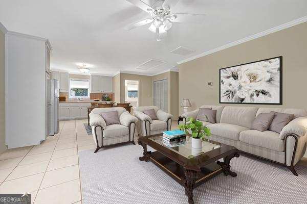 122 Hodges Lane Hartwell, GA 30643 - Photo 35 of 37 a living room with furniture flowerpot and a chandelier
