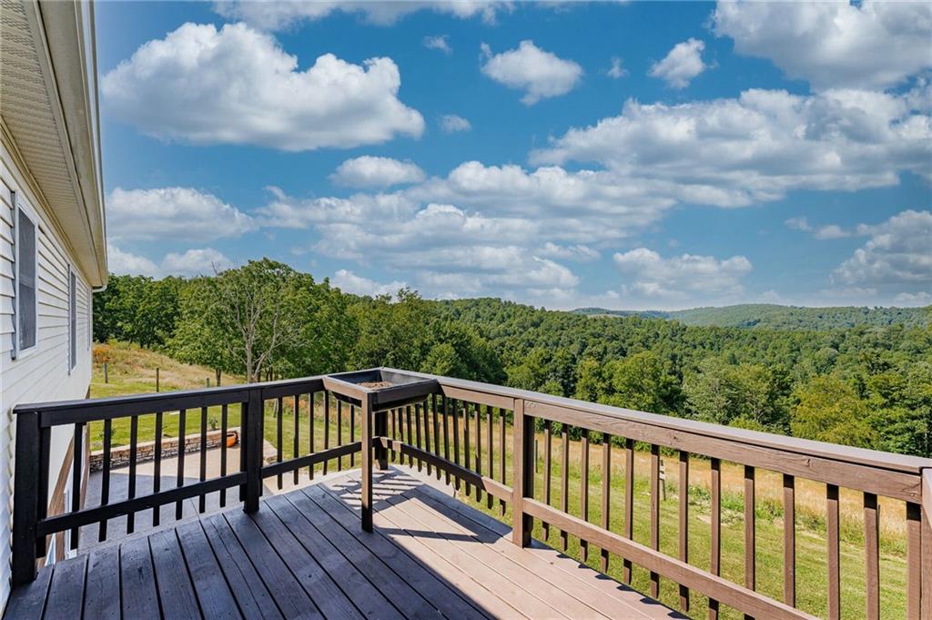 156 Haines Ridge Road Mount Morris, PA 15349 - Photo 45 of 49 a view of balcony with wooden floor