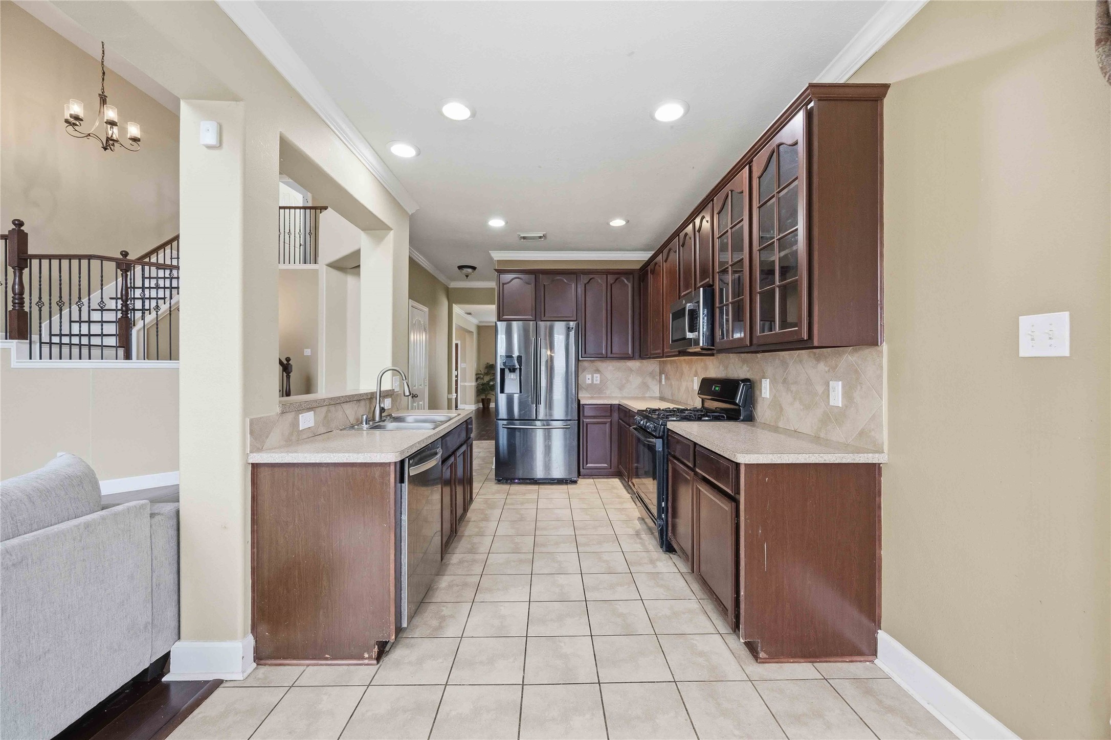803 Northridge Terrace Lane Spring, TX 77373 - Photo 15 of 42 a large kitchen with stainless steel appliances lots of counter top space and cabinets