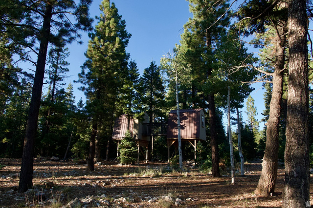 140 East Rim Road Duck Creek Village, UT 84762 - Photo 21 of 45 View of yard featuring a wooden deck