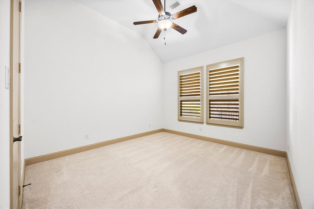 6814 Springwood Lane Garland, TX 75044 - Photo 5 of 35 a view of an empty room with a window