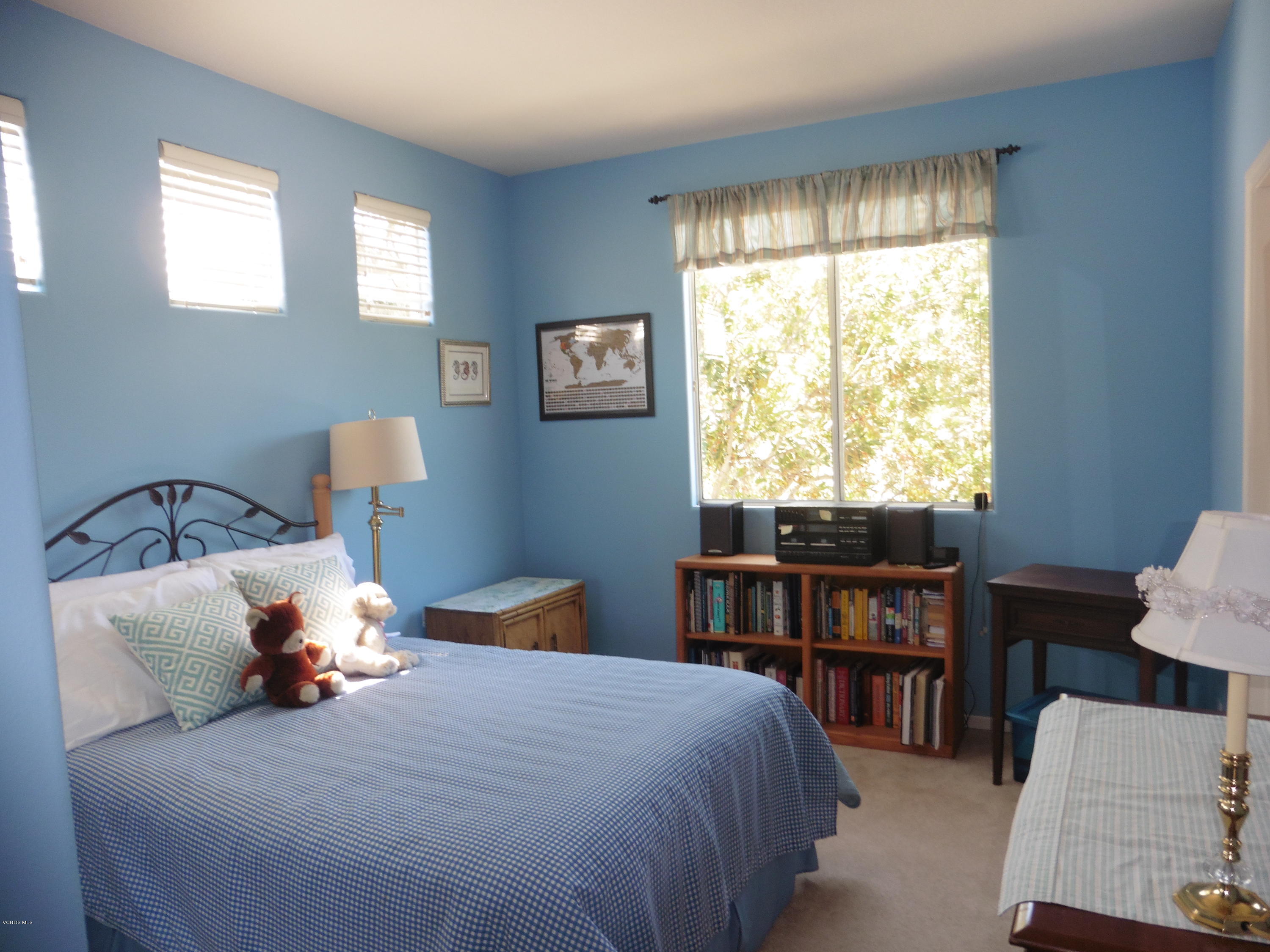 11285 Shadyridge Road Moorpark, CA 93021 - Photo 14 of 31 a bedroom with a bed and a window