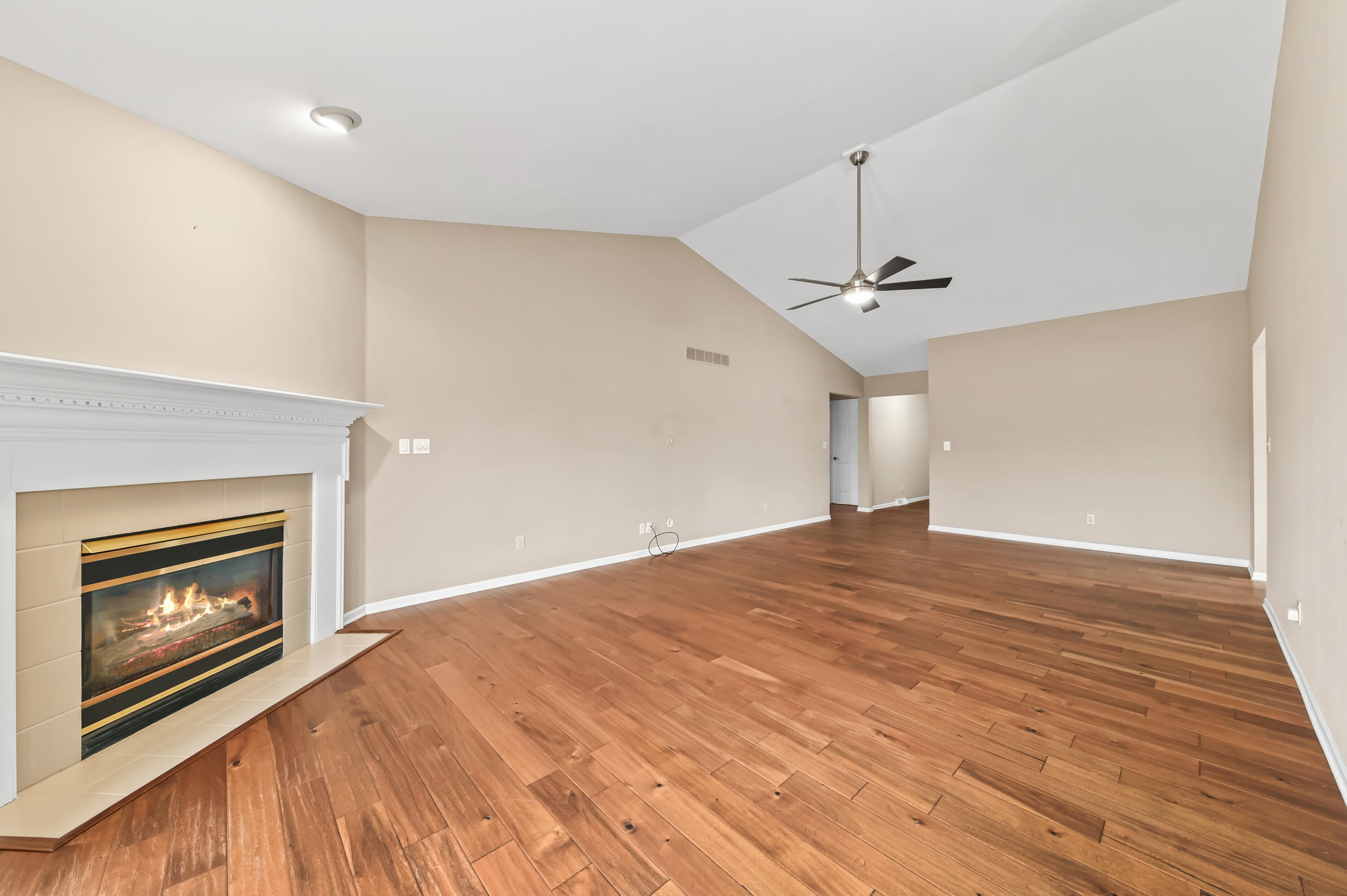 4575 Turtle Creek Drive, Unit A Brookfield, WI 53005 - Photo 24 of 39 gas fireplace warms the room