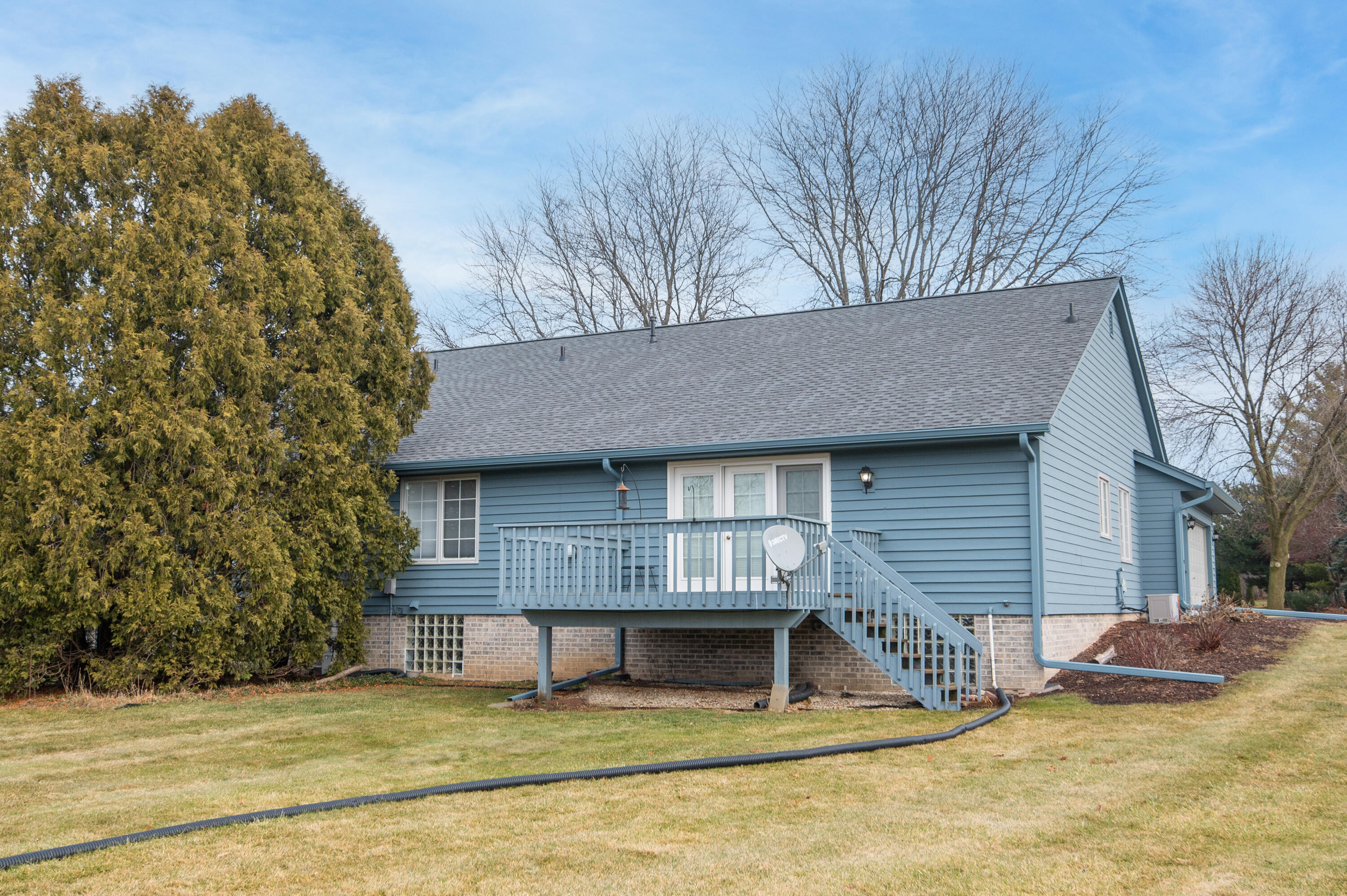 4575 Turtle Creek Drive, Unit A Brookfield, WI 53005 - Photo 35 of 39 view from the yard to the private deck