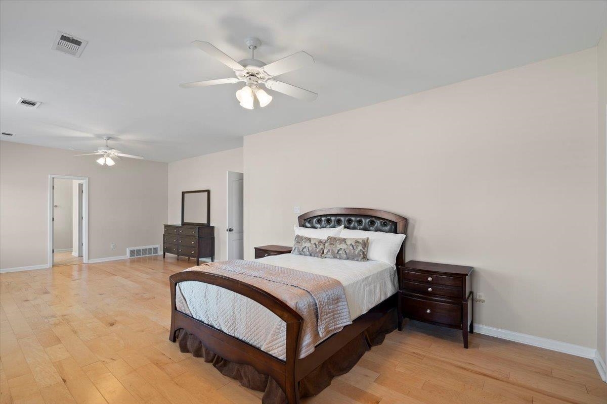 170 Jamerson Farm Road Collierville, TN 38017 - Photo 26 of 40 Bedroom with light hardwood / wood-style flooring and ceiling fan