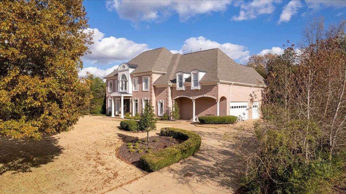 170 Jamerson Farm Road Collierville, TN 38017 - Photo 3 of 40 French provincial home featuring a balcony and a garage
