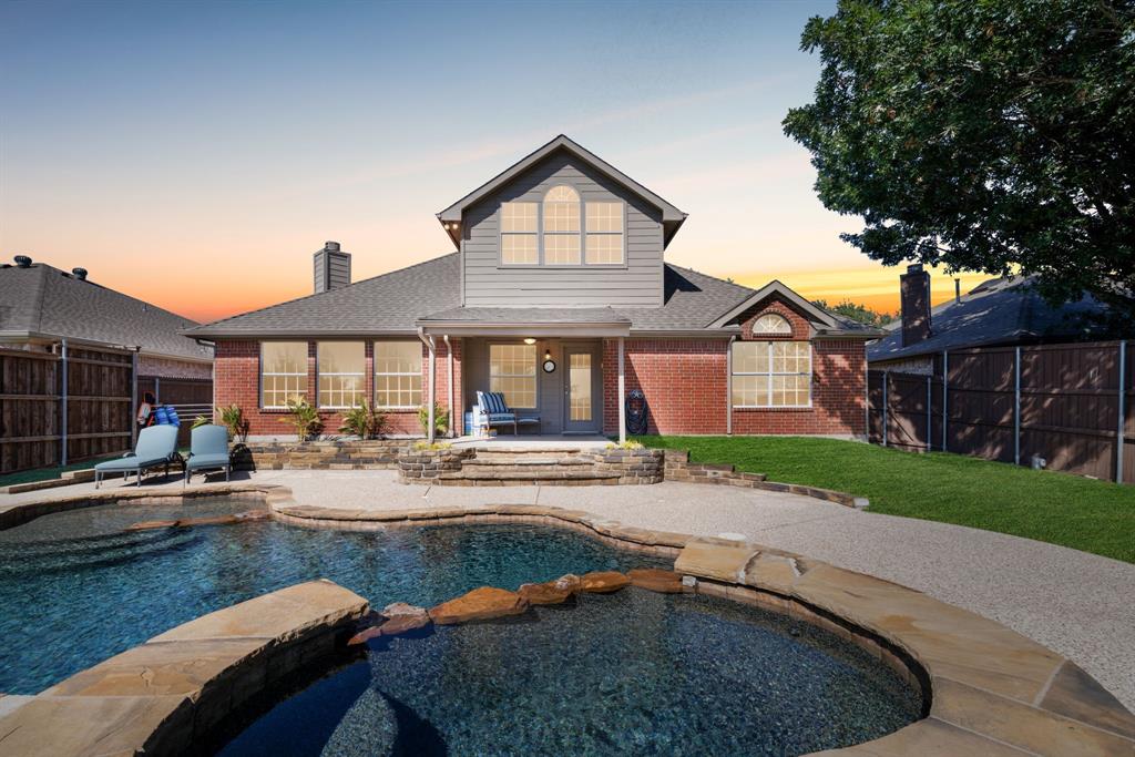 10903 Robincreek Lane Frisco, TX 75035 - Photo 14 of 17 a front view of house with yard and outdoor seating