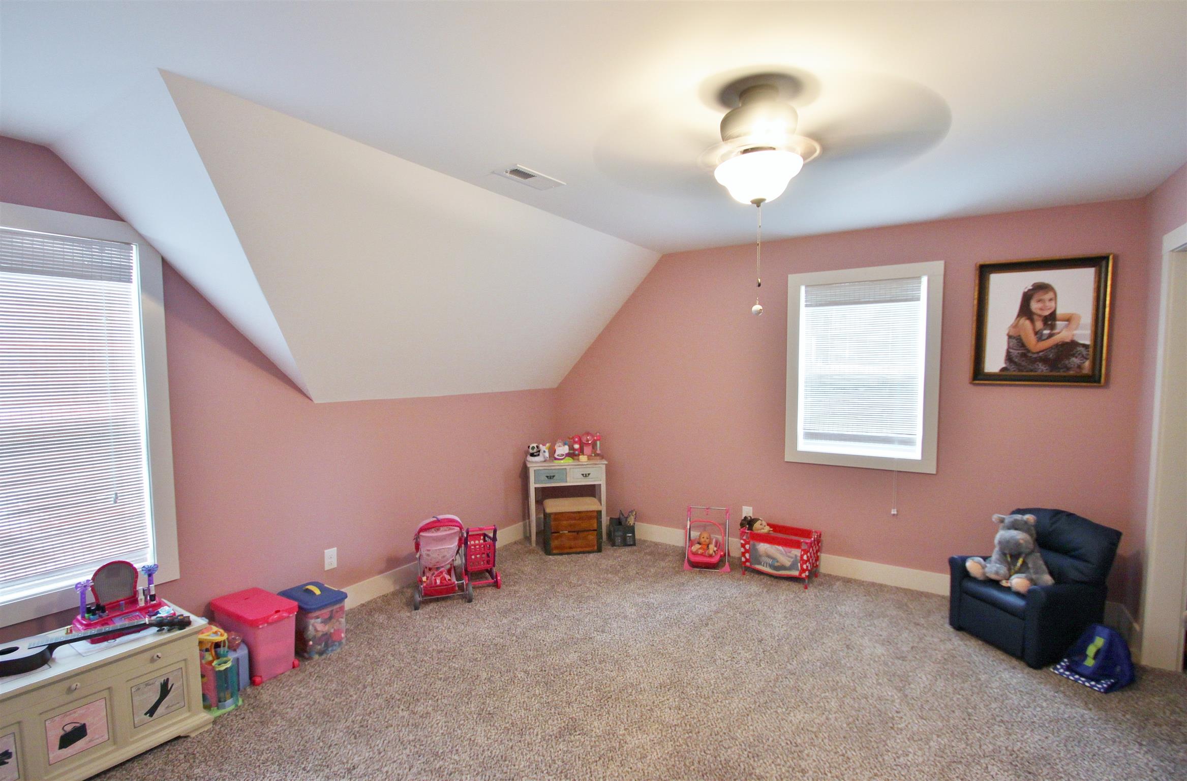 54 Snow Tree Bend Manchester, TN 37355 - Photo 14 of 16 a bedroom with furniture and a chandelier fan
