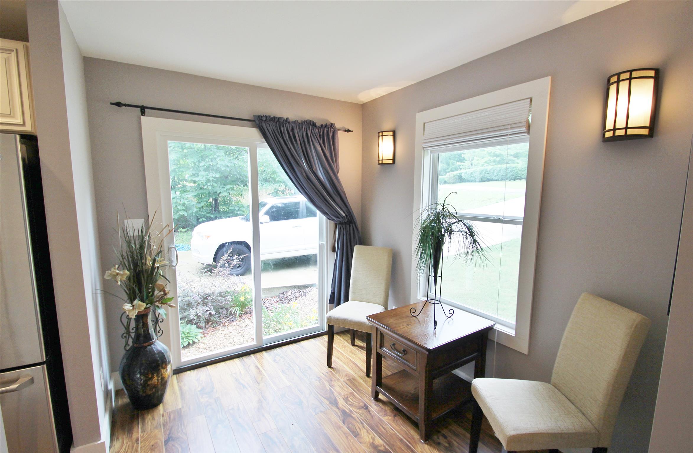 54 Snow Tree Bend Manchester, TN 37355 - Photo 7 of 16 a living room with furniture a window and a floor to ceiling window